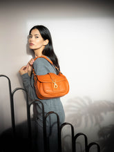 Load image into Gallery viewer, Abro Medium Star Saddle Leather Shoulder Bag in Orange
